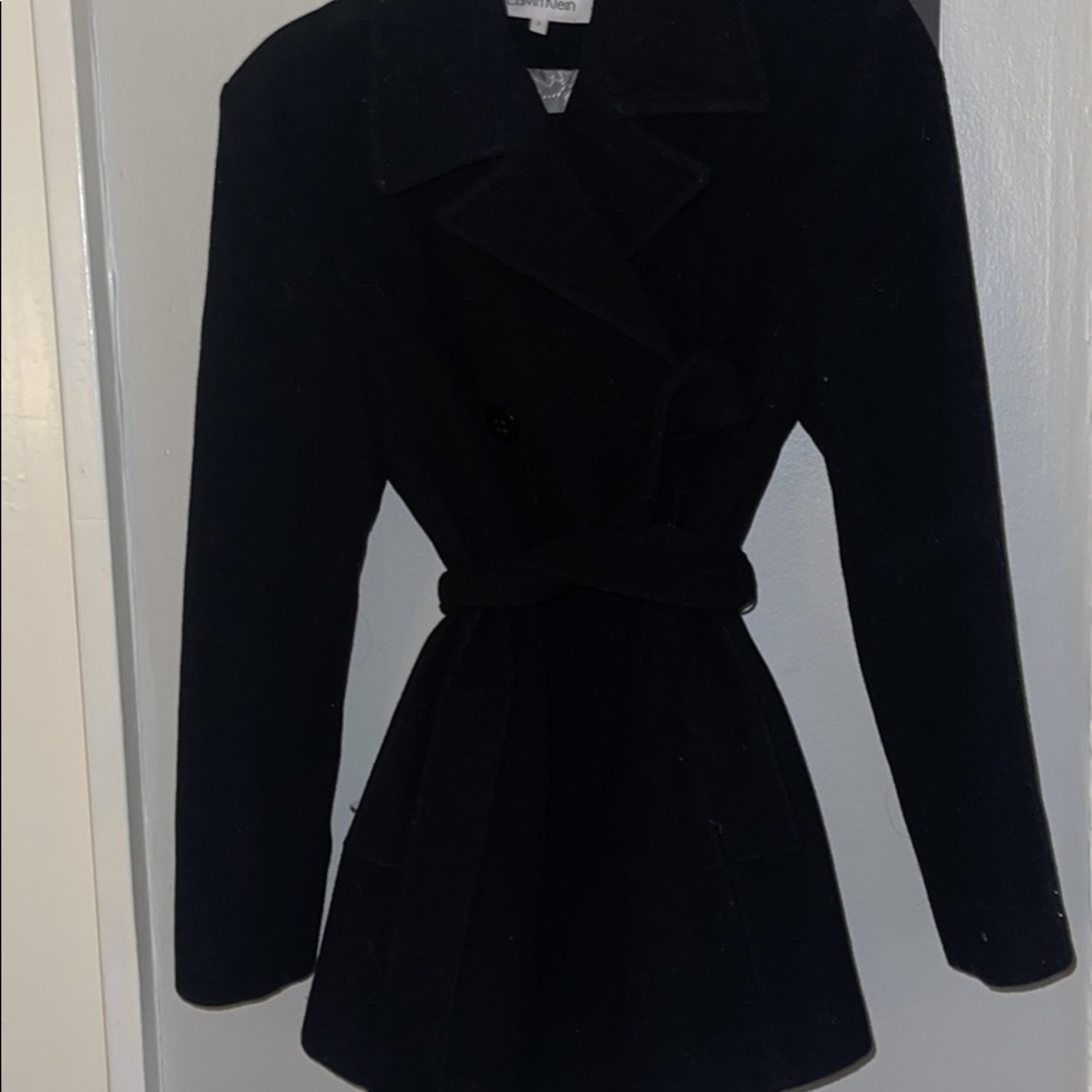 Size 2 black Calvin Klein pea coat, only worn once. It’s in great condition